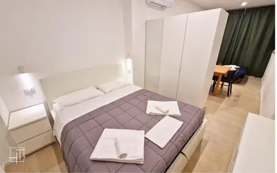 Letto o letti in una camera di HT - Moderno Mini in zona Portello