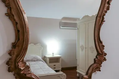 Letto o letti in una camera di La Dimora di Lara B&B