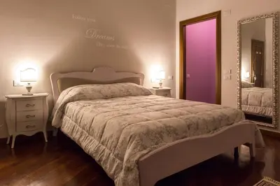 Letto o letti in una camera di La Dimora di Lara B&B