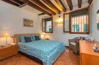 Letto o letti in una camera di Garibaldi Home