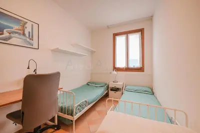 Letto o letti in una camera di Residence Le Vignole Mare