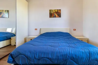 Letto o letti in una camera di Airport Marco Polo -free park-