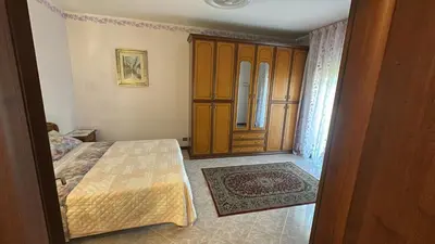 Letto o letti in una camera di Casa Benvenuto