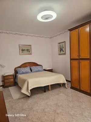 Letto o letti in una camera di Casa Benvenuto