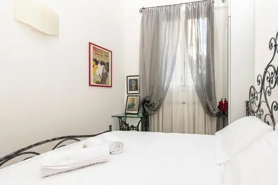 Letto o letti in una camera di GuestHost - Stylish Flat in Dorsoduro District