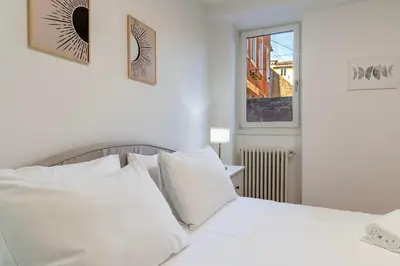 Letto o letti in una camera di Ca' delle Muneghe