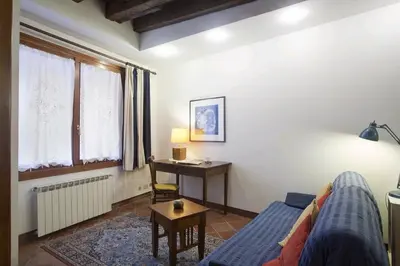 Letto o letti in una camera di Tedeschi - LOCAPPART