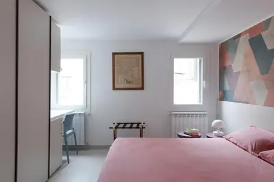 Letto o letti in una camera di Chioggia Vibes - Appartamento centro storico e mare