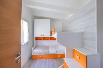 Letto o letti in una camera di Villetta ai Pini by Venicevillas