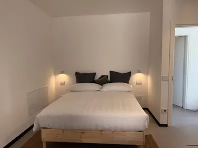 Letto o letti in una camera di Casa Anna