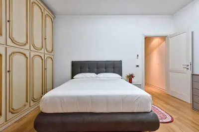 Letto o letti in una camera di Paleocapa Apartments
