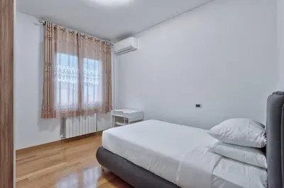 Letto o letti in una camera di Paleocapa Apartments