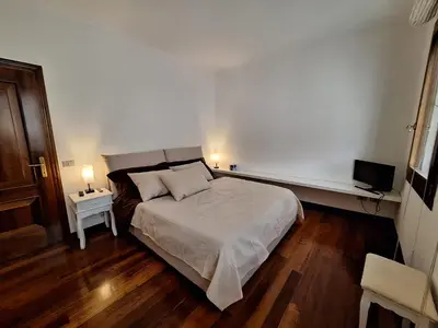 Letto o letti in una camera di Centro Storico
