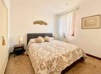 Letto o letti in una camera di Ca Moro - elegant apartment with private terrace