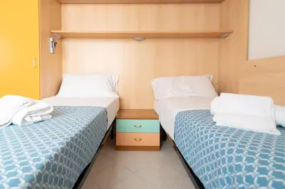 Letto o letti in una camera di Casa Delia