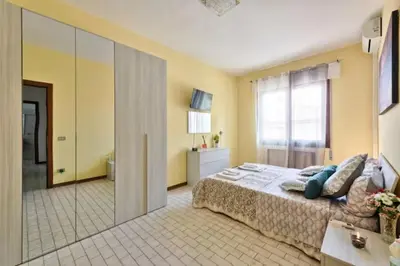 Letto o letti in una camera di Venice Miramare Residence 2
