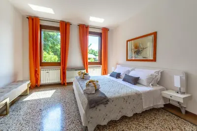 Letto o letti in una camera di Ca'Baldin Venezia-Marghera