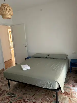 Letto o letti in una camera di NetTiozzo Home - Vacanze ad un passo dal mare