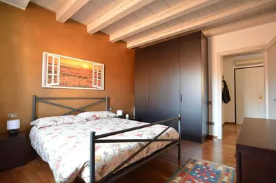 Letto o letti in una camera di Il Sambuco - in pieno centro