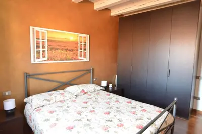 Letto o letti in una camera di Il Sambuco - in pieno centro