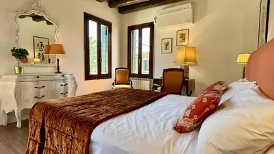 Letto o letti in una camera di Ca' Angelica Canal View