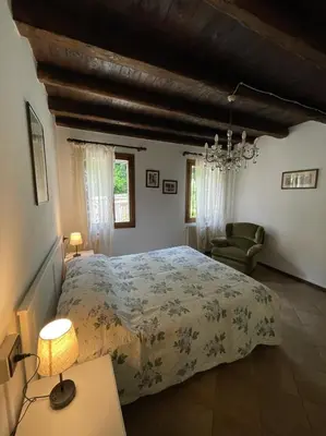 Letto o letti in una camera di Ai Due Ponti