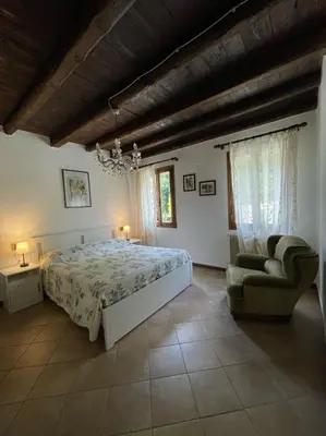 Letto o letti in una camera di Ai Due Ponti