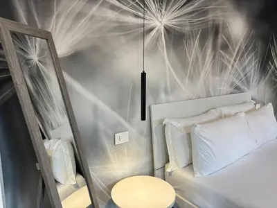 Letto o letti in una camera di Mood House Apartsuite