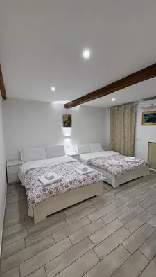 Letto o letti in una camera di Sanella Rooms