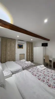 Letto o letti in una camera di Sanella Rooms