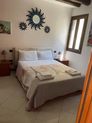 Letto o letti in una camera di Casa Michela