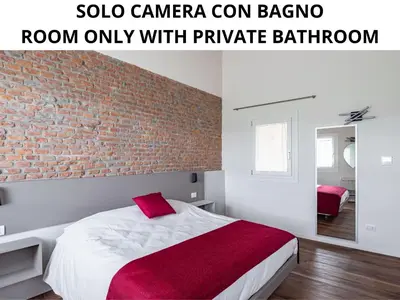 Letto o letti in una camera di Ca' Mia - Casa Belfiore
