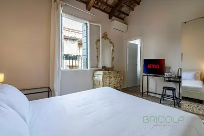 Letto o letti in una camera di Biennale Ensuite Rooms By Bricola Apartments