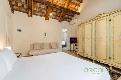 Letto o letti in una camera di Biennale Ensuite Rooms By Bricola Apartments