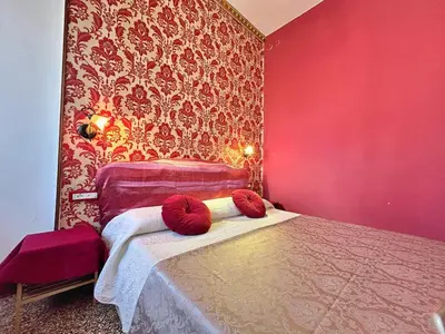 Letto o letti in una camera di Mosaico Apartment