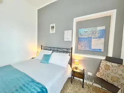 Letto o letti in una camera di Mosaico Apartment