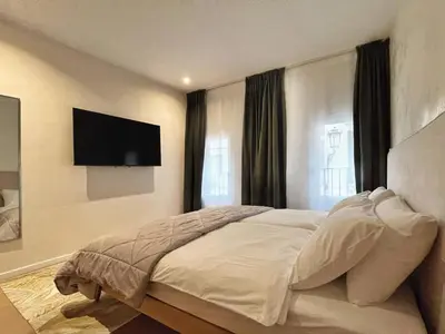 Letto o letti in una camera di Elegant Apartment near Prato della Valle & Basilica Santo