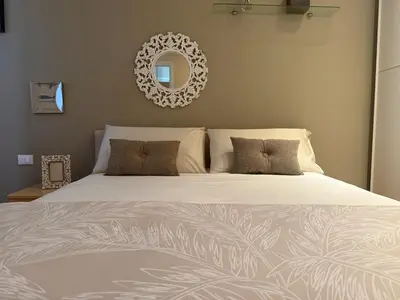 Letto o letti in una camera di CORTE SARDINA lungo la laguna di Sottomarina di Chioggia
