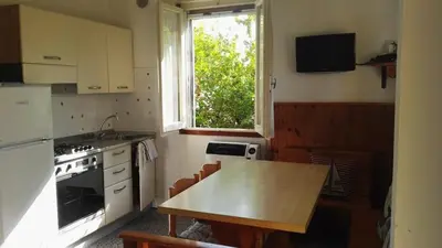 Cucina o angolo cottura di 2 bedrooms Villa with sea view terrace in Jesolo