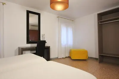 Letto o letti in una camera di Residence San Marco