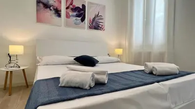 Letto o letti in una camera di Relax Terrace, Venice Historical Center