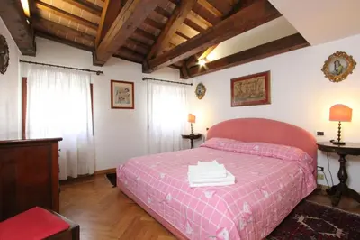 Letto o letti in una camera di Zoia Terrace view on St Marks Basilica 150mt
