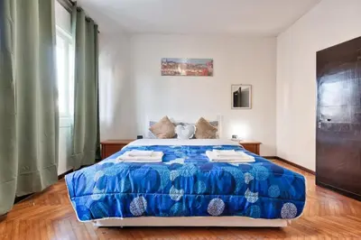 Letto o letti in una camera di Cozy Miranese Venice Apartment