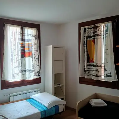 Letto o letti in una camera di Casa Aurora