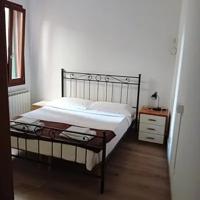 Letto o letti in una camera di Casa Aurora