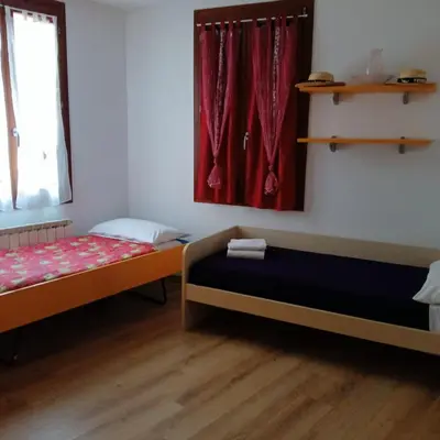 Letto o letti in una camera di Casa Aurora