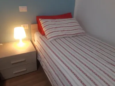 Letto o letti in una camera di Casa Patavina