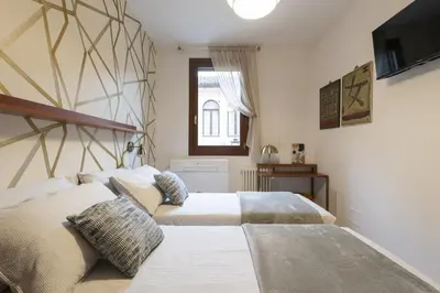 Letto o letti in una camera di CA' FORTE RESIDENCE