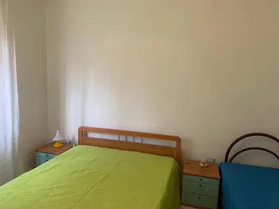 Letto o letti in una camera di Renovated apartment on the ground floor