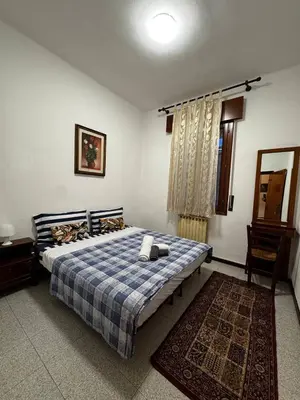 Letto o letti in una camera di Casa Bella - Room 4